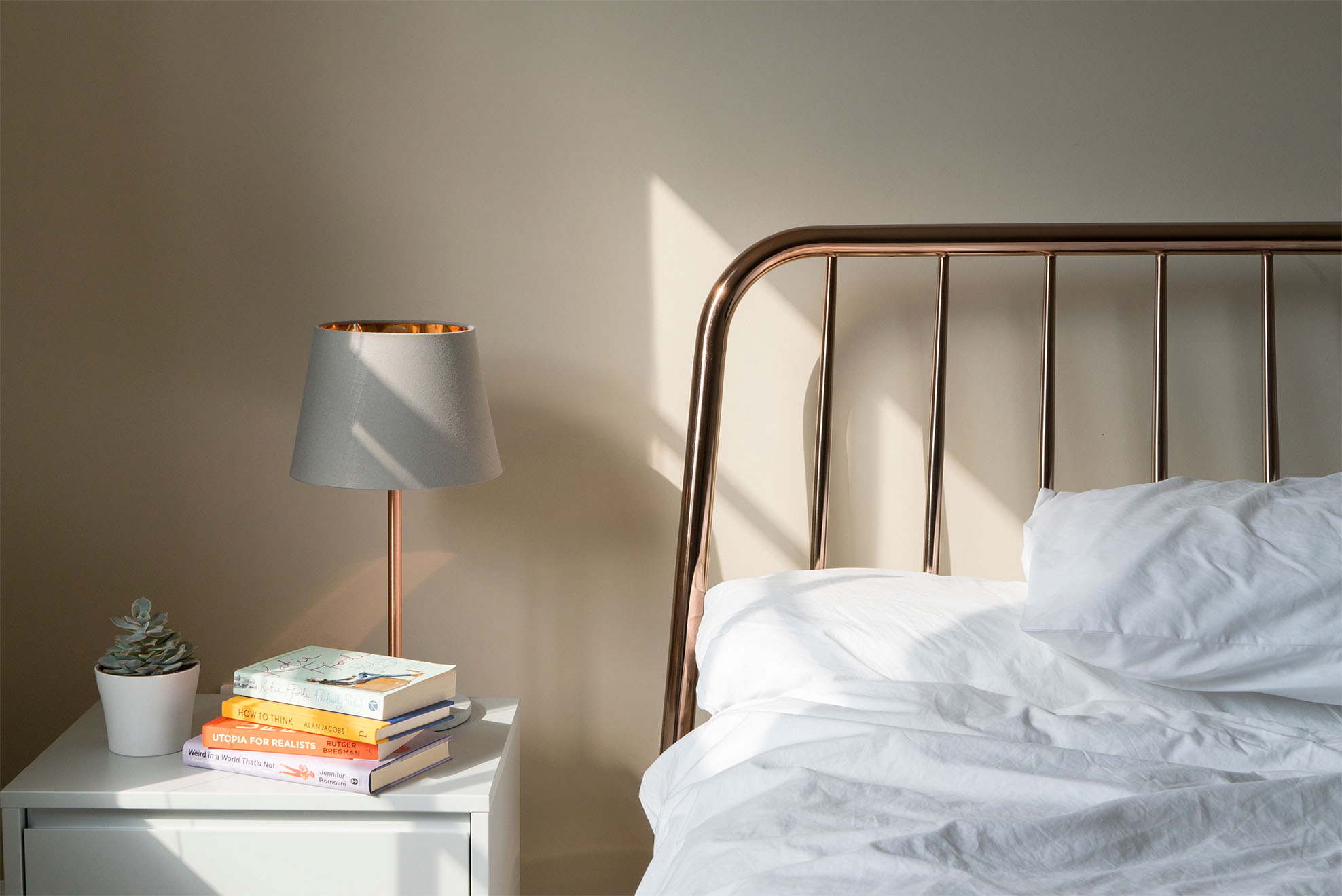 headboard of bed and nightstand