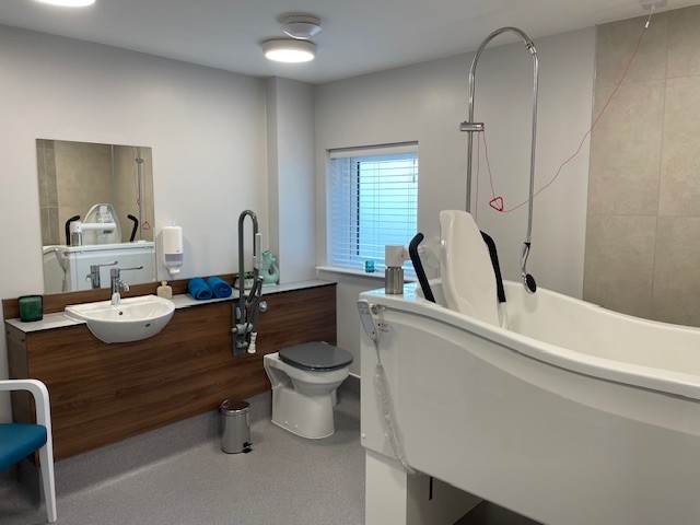 bathroom with accessible tub